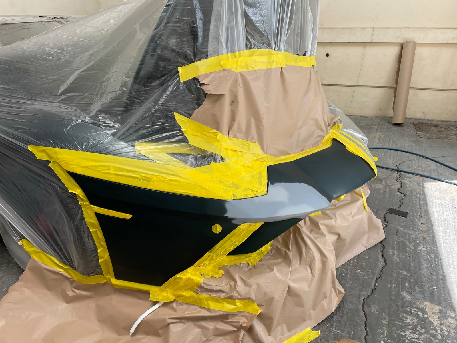 Lamborghini bumper prepared and part painted in the workshop